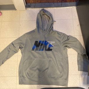 A grey Nike hoodie